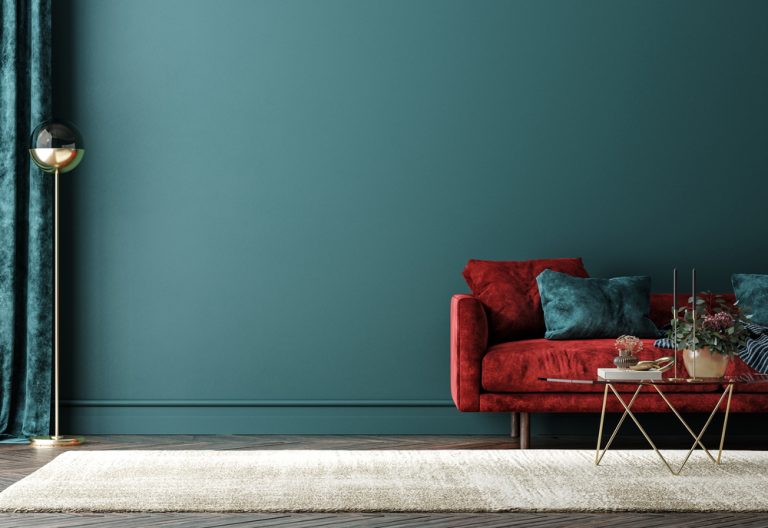 Home,Interior,With,Red,Sofa,,Table,And,Decor,In,Green